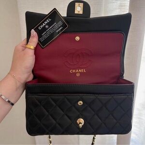 CHANEL Black Quilted Shoulder Bag with Burgundy Interior